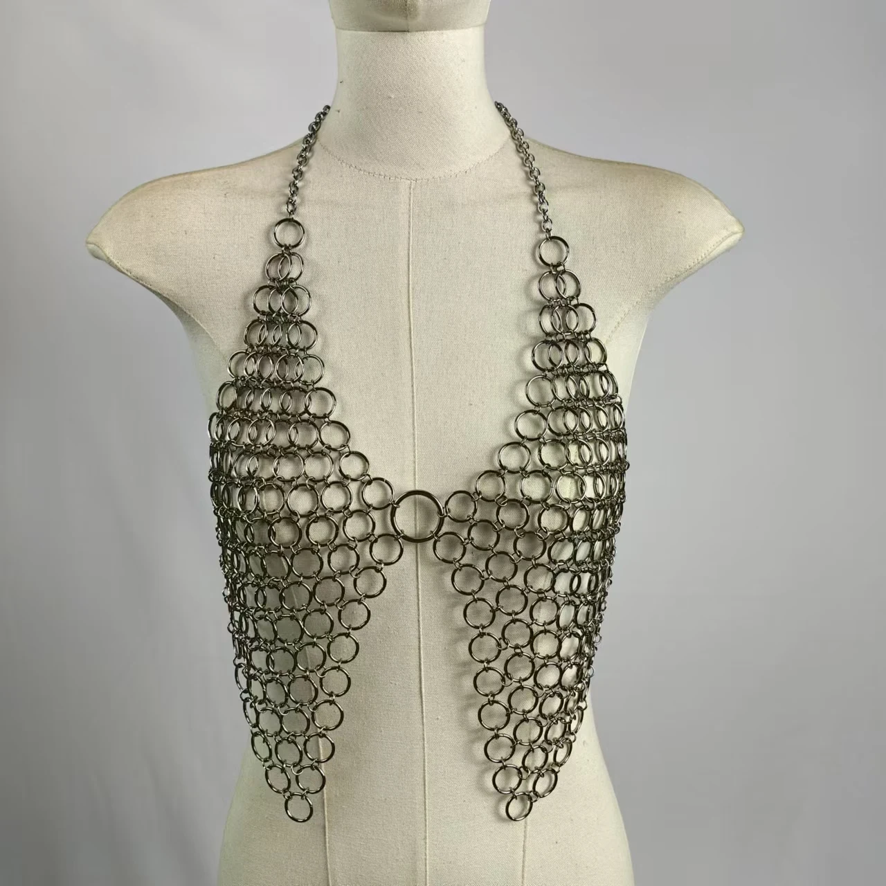 FREE SHIPPING Metal Chainmail Halter Bra Top Edgy Festival And Clubwear JKP7320 Chainmail-style halter bra top made of metal rings – bold silver statement festival and clubwear for women